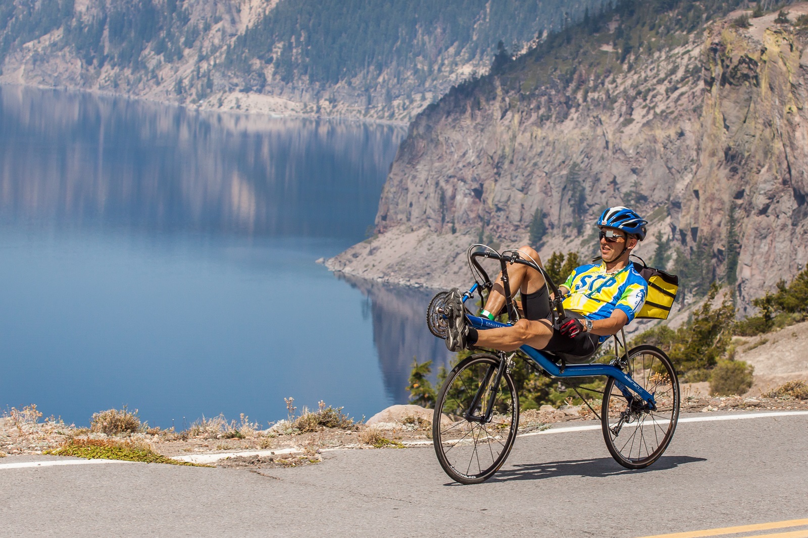 Kyle Banerjee cycling around Crater Lake